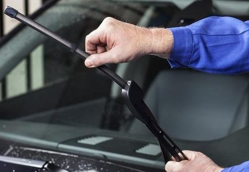 Man changing wiper blades_Getty_resized